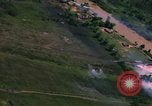 Standbild Flugzeuge Bomben auf vietnamesische Dorf Vietnam, 1965, aus Sekunde 27 historischem Filmmaterial Videoclip 65675054847