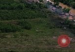Standbild Flugzeuge Bomben auf vietnamesische Dorf Vietnam, 1965, aus Sekunde 35 historischem Filmmaterial Videoclip 65675054847