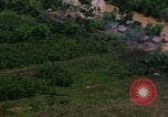 Standbild Flugzeuge Bomben auf vietnamesische Dorf Vietnam, 1965, aus Sekunde 37 historischem Filmmaterial Videoclip 65675054847