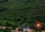 Standbild Flugzeuge Bomben auf vietnamesische Dorf Vietnam, 1965, aus Sekunde 44 historischem Filmmaterial Videoclip 65675054847