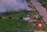 Standbild Flugzeuge Bomben auf vietnamesische Dorf Vietnam, 1965, aus Sekunde 48 historischem Filmmaterial Videoclip 65675054847