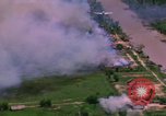 Standbild Flugzeuge Bomben auf vietnamesische Dorf Vietnam, 1965, aus Sekunde 51 historischem Filmmaterial Videoclip 65675054847