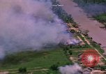 Standbild Flugzeuge Bomben auf vietnamesische Dorf Vietnam, 1965, aus Sekunde 52 historischem Filmmaterial Videoclip 65675054847