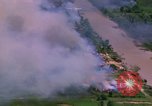 Standbild Flugzeuge Bomben auf vietnamesische Dorf Vietnam, 1965, aus Sekunde 55 historischem Filmmaterial Videoclip 65675054847