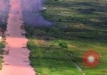 Image of Aerial bombing views of village in Vietnam war Vietnam, 1965, second 1 stock footage video 65675054848