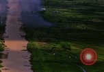 Image of Aerial bombing views of village in Vietnam war Vietnam, 1965, second 3 stock footage video 65675054848