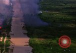 Image of Aerial bombing views of village in Vietnam war Vietnam, 1965, second 5 stock footage video 65675054848
