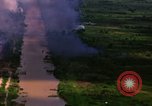 Image of Aerial bombing views of village in Vietnam war Vietnam, 1965, second 6 stock footage video 65675054848