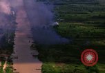 Image of Aerial bombing views of village in Vietnam war Vietnam, 1965, second 7 stock footage video 65675054848