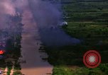 Image of Aerial bombing views of village in Vietnam war Vietnam, 1965, second 8 stock footage video 65675054848