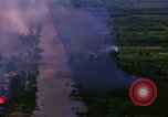 Image of Aerial bombing views of village in Vietnam war Vietnam, 1965, second 11 stock footage video 65675054848