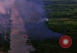 Image of Aerial bombing views of village in Vietnam war Vietnam, 1965, second 12 stock footage video 65675054848