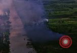 Image of Aerial bombing views of village in Vietnam war Vietnam, 1965, second 13 stock footage video 65675054848