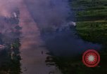 Image of Aerial bombing views of village in Vietnam war Vietnam, 1965, second 14 stock footage video 65675054848