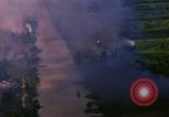 Image of Aerial bombing views of village in Vietnam war Vietnam, 1965, second 16 stock footage video 65675054848
