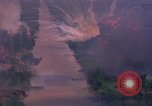 Image of Aerial bombing views of village in Vietnam war Vietnam, 1965, second 25 stock footage video 65675054848