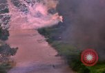 Image of Aerial bombing views of village in Vietnam war Vietnam, 1965, second 29 stock footage video 65675054848
