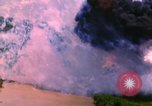 Image of Aerial bombing views of village in Vietnam war Vietnam, 1965, second 37 stock footage video 65675054848