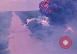 Image of Aerial bombing views of village in Vietnam war Vietnam, 1965, second 45 stock footage video 65675054848