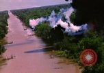 Image of Aerial bombing views of village in Vietnam war Vietnam, 1965, second 48 stock footage video 65675054848