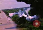 Image of Aerial bombing views of village in Vietnam war Vietnam, 1965, second 49 stock footage video 65675054848