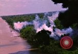 Image of Aerial bombing views of village in Vietnam war Vietnam, 1965, second 50 stock footage video 65675054848