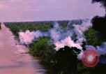 Image of Aerial bombing views of village in Vietnam war Vietnam, 1965, second 51 stock footage video 65675054848