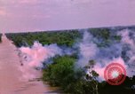 Image of Aerial bombing views of village in Vietnam war Vietnam, 1965, second 53 stock footage video 65675054848