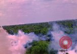 Image of Aerial bombing views of village in Vietnam war Vietnam, 1965, second 54 stock footage video 65675054848