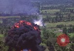 Image of American Skyraider aircraft bombing run Vietnam War Vietnam, 1965, second 10 stock footage video 65675054854