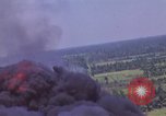 Image of American Skyraider aircraft bombing run Vietnam War Vietnam, 1965, second 14 stock footage video 65675054854