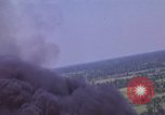 Image of American Skyraider aircraft bombing run Vietnam War Vietnam, 1965, second 15 stock footage video 65675054854