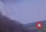 Image of American Skyraider aircraft bombing run Vietnam War Vietnam, 1965, second 16 stock footage video 65675054854