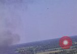 Image of American Skyraider aircraft bombing run Vietnam War Vietnam, 1965, second 18 stock footage video 65675054854