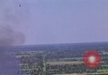 Image of American Skyraider aircraft bombing run Vietnam War Vietnam, 1965, second 19 stock footage video 65675054854