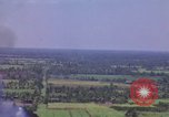Image of American Skyraider aircraft bombing run Vietnam War Vietnam, 1965, second 20 stock footage video 65675054854