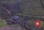 Image of American Skyraider aircraft bombing run Vietnam War Vietnam, 1965, second 33 stock footage video 65675054854