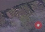Image of American Skyraider aircraft bombing run Vietnam War Vietnam, 1965, second 48 stock footage video 65675054854
