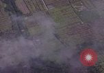 Image of American Skyraider aircraft bombing run Vietnam War Vietnam, 1965, second 52 stock footage video 65675054854