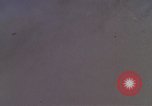 Image of huts attacked in bombing mission in Vietnam War Vietnam, 1965, second 16 stock footage video 65675054855