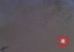 Image of huts attacked in bombing mission in Vietnam War Vietnam, 1965, second 17 stock footage video 65675054855