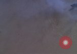 Image of huts attacked in bombing mission in Vietnam War Vietnam, 1965, second 18 stock footage video 65675054855