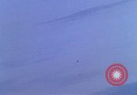 Image of huts attacked in bombing mission in Vietnam War Vietnam, 1965, second 28 stock footage video 65675054855