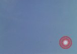 Image of huts attacked in bombing mission in Vietnam War Vietnam, 1965, second 33 stock footage video 65675054855