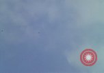 Image of huts attacked in bombing mission in Vietnam War Vietnam, 1965, second 36 stock footage video 65675054855