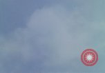 Image of huts attacked in bombing mission in Vietnam War Vietnam, 1965, second 38 stock footage video 65675054855