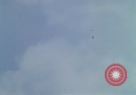 Image of huts attacked in bombing mission in Vietnam War Vietnam, 1965, second 39 stock footage video 65675054855