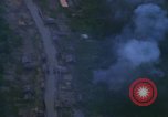 Image of huts attacked in bombing mission in Vietnam War Vietnam, 1965, second 49 stock footage video 65675054855