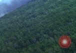 Image of air strike mission bu USAF A-1E in Vietnam Vietnam, 1965, second 4 stock footage video 65675054856