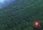 Image of air strike mission bu USAF A-1E in Vietnam Vietnam, 1965, second 5 stock footage video 65675054856